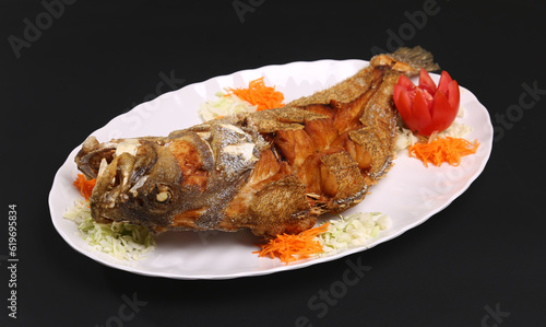 deep fried whole fish fry Arabic style photo