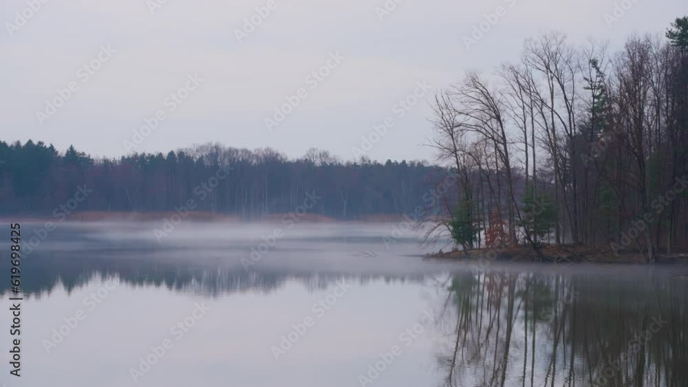 misty morning on Lake Erie with fog over the water misty morning on Lake Erie with fog over the water