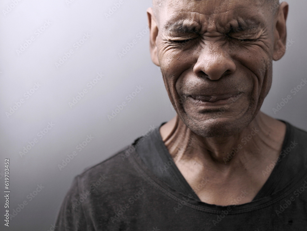 men crying in desperation with people stock photo on grey ackground men crying in desperation with people stock photo on grey ackground