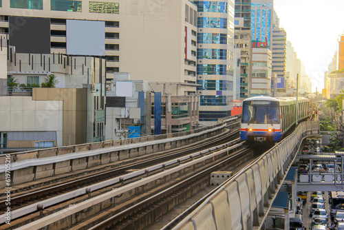 BTS Sky Train is running in downtown of Bangkok in the morning. Sky train is fastest transport mode in Bangkok