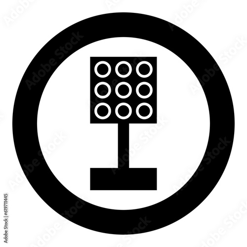 Stadium spotlight floodlight tower bright light icon in circle round black color vector illustration image solid outline style