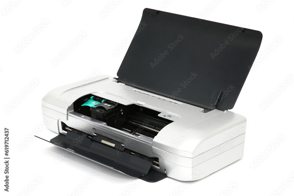 Printer for printing documents using a cartridge with an open lid for changing the cartridge. Isolated printer on a white background Printer for printing documents using a cartridge with an open lid for changing the cartridge. Isolated printer on a white background