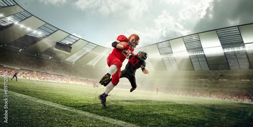 American football players in uniform  in motion during game  running with ball at 3D stadium. Open air sports arena. Concept of professional sport  competition  match  action  energy  success  hobby