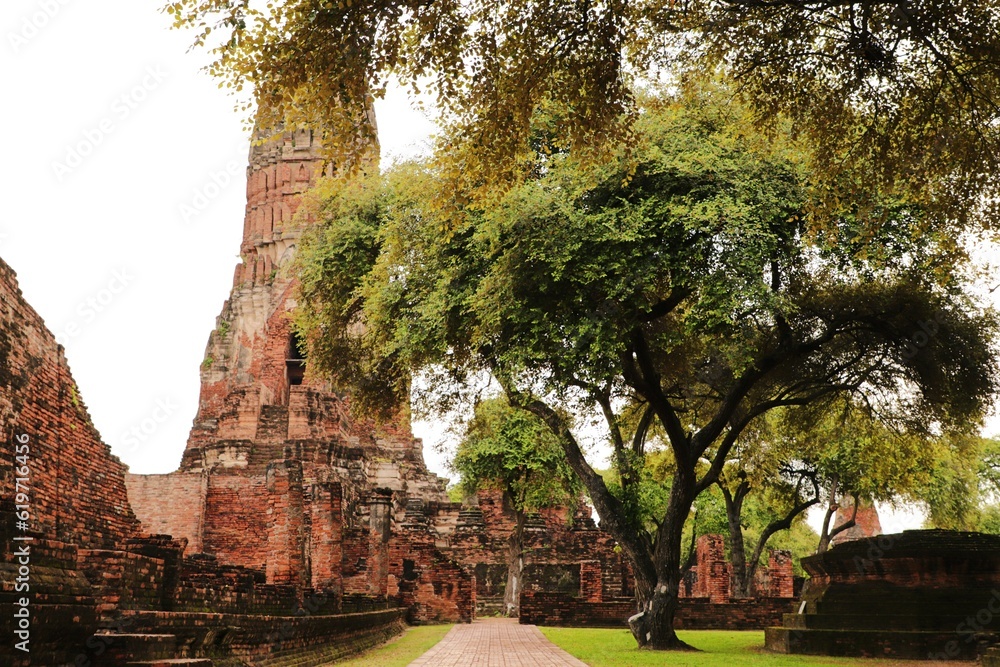 Ruins of the main prang of Wat Phra Ram at Ayutthaya in Thailand.Historic site or Archaeological site in Thailand. Ruins of the main prang of Wat Phra Ram at Ayutthaya in Thailand.Historic site or Archaeological site in Thailand.