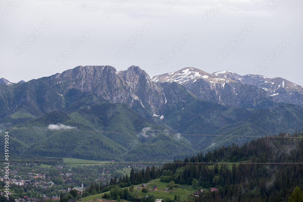 Panorama of the mountain range from Gubalowka mountain. Snow-capped mountains.
