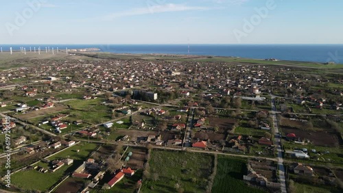 Aerial view of small village near the sea photo