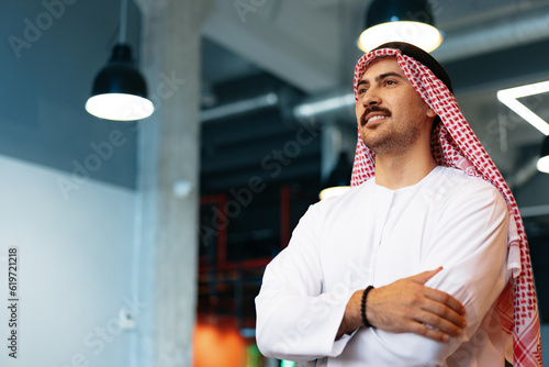 Photography Successful muslim businessmen in traditional outfit in his office