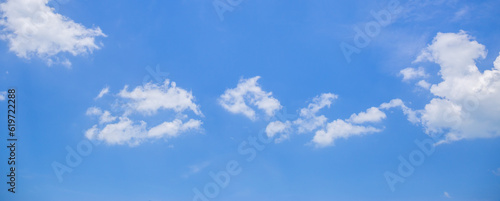 photo of blue sky and white clouds or cloudscape.