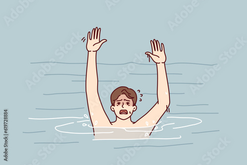 Drowning man screams trying to call for help after sudden spasm that happened while swimming. Drowning guy who suddenly finds himself in sea or ocean needs help of rescuers or life buoy