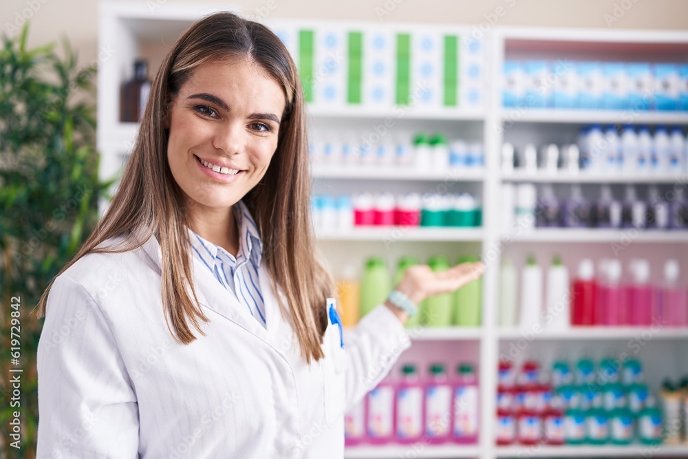 Young beautiful hispanic woman pharmacist smiling confident standing at street