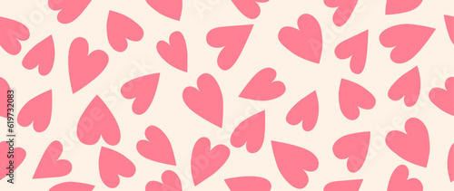 Vector illustration. Seamless pattern of hearts. Light background and pink hearts. Cute print. Perfect for wallpaper, cover, screen saver and textile design.