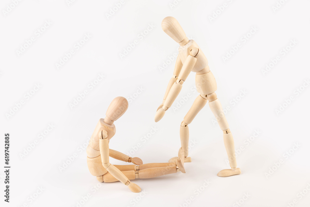 Wooden mannequin, Concern and worry of friend. Mental health, PTSD and suicide prevention. Post-traumatic stress disorder. Wooden mannequin, Concern and worry of friend. Mental health, PTSD and suicide prevention. Post-traumatic stress disorder.