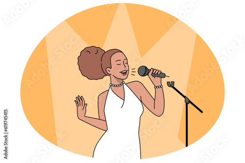 African American woman singing on stage