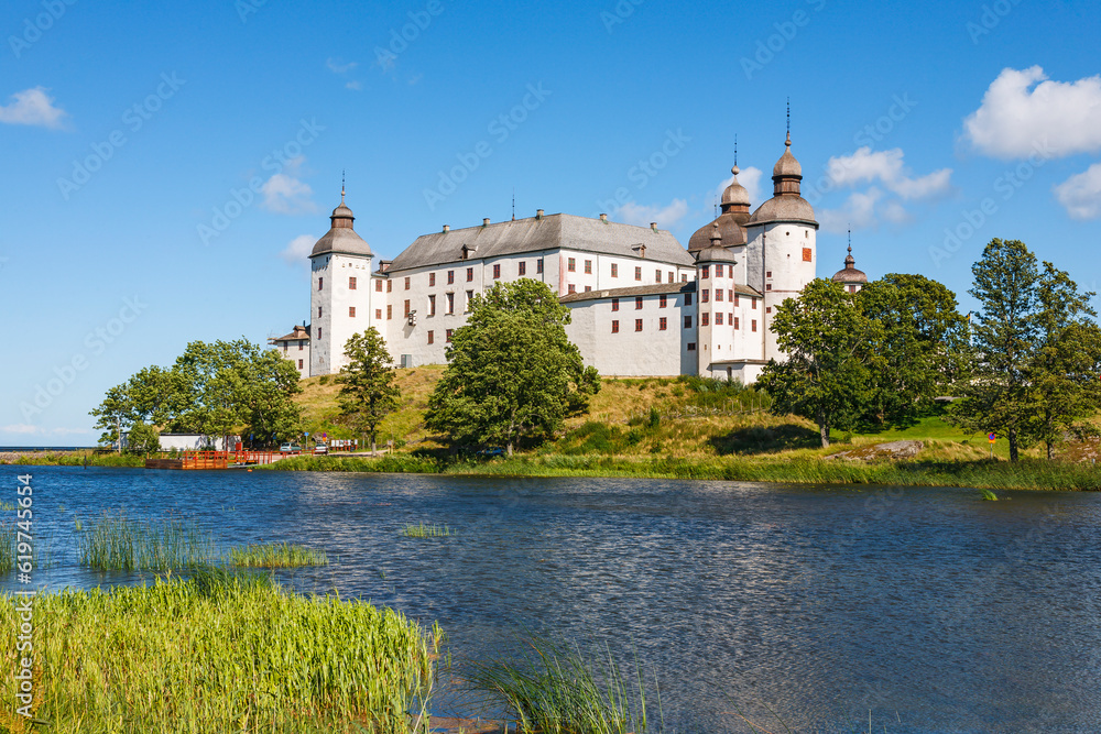 Beautiful castle on a hill by a lake Beautiful castle on a hill by a lake