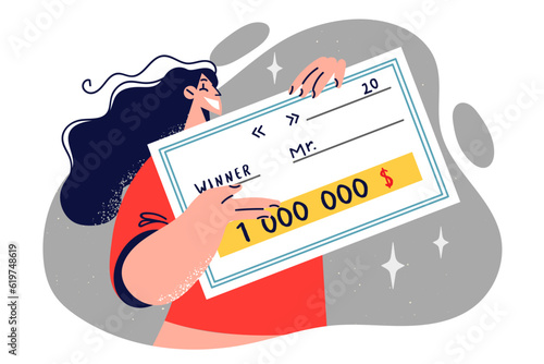 Lottery winner woman holding big check for million dollars and showing cash prize in game of chance