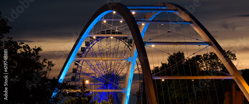 BRIDGE OVER THE RIVER - An object of urban infrastructure in night illumination

