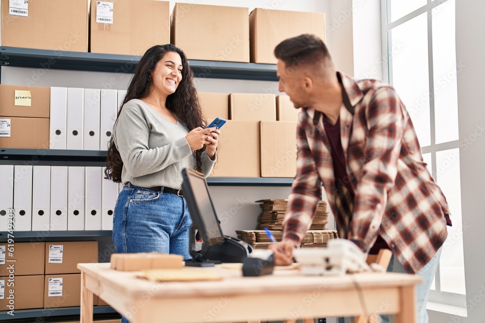 Fototapeta premium Man and woman ecommerce bussines workers working at office