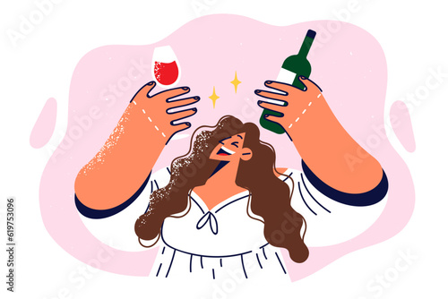 Drunk girl holding bottle of red wine and glass offering to drink during birthday party