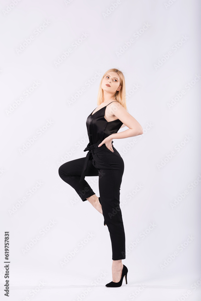 Portrait of an elegant and beautiful blonde girl on a white background