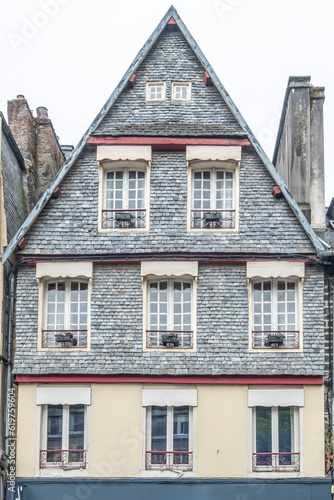 Morlaix, Brittany, France - 2022 August 21: Traditional French facade of a town house located in Morlaix, Typical houses of French Brittany © ikuday