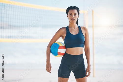 Volleyball, fitness and portrait of woman on beach ready for exercise, training and workout for game. Sports, motivation and female athlete with ball by ocean for practice, match and competition