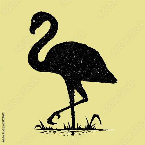 Silhouette bird flamingo on a yellow  background