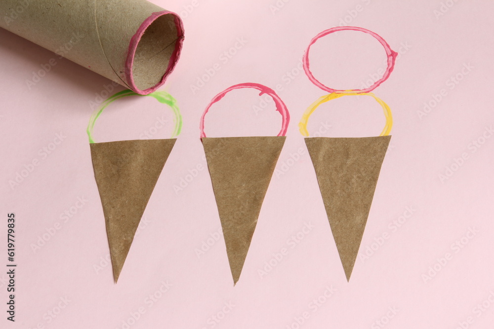 Ice cream craft. Stamping with a toilet paper roll. Waffle cones are made from reused packaging paper. Ice cream craft. Stamping with a toilet paper roll. Waffle cones are made from reused packaging paper.