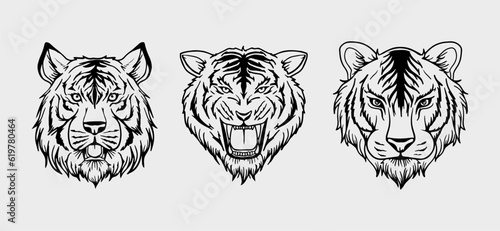 black and white tiger head vector illustration consisting of three images