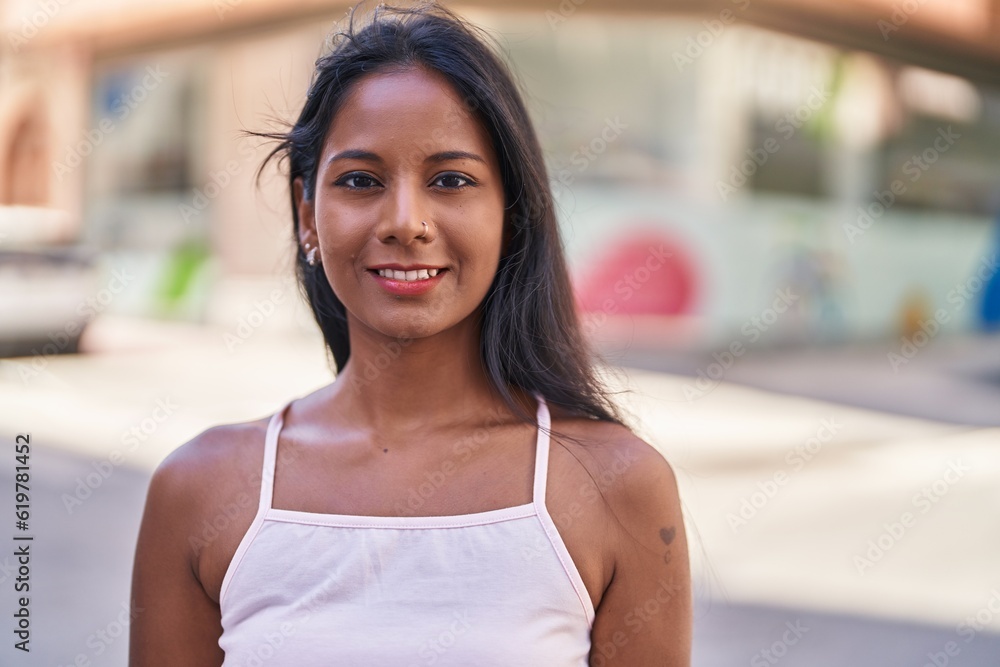 Young beautiful woman smiling confident standing at street Young beautiful woman smiling confident standing at street