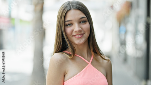 Young beautiful girl smiling confident standing at street Free Download Young beautiful girl smiling confident standing at street - GFXLoad