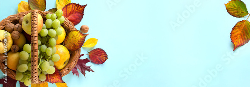 art agriculture assortment background Thanksgiving art; autumn leaves and Fruit basket with fresh autumn Fruit