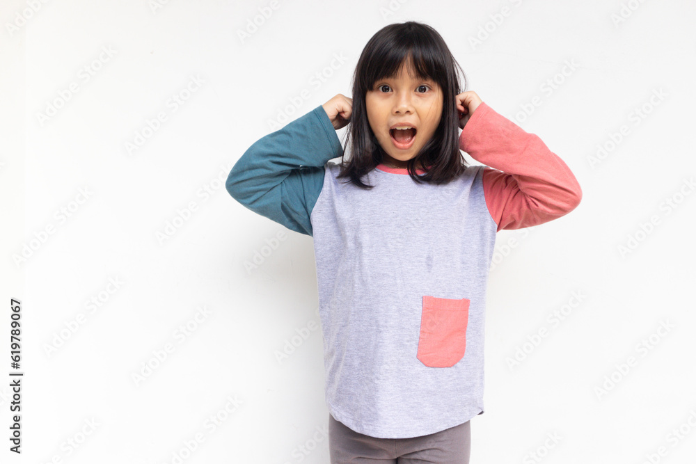 Surprised happy beautiful girl looking at camera in excitement, isolated on white background Surprised happy beautiful girl looking at camera in excitement, isolated on white background