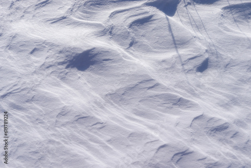 Patterns on the snow. Background. Texture.