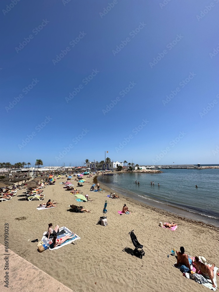 Beach and sea view with a clear blue sky background taken in Marbella Spain. 