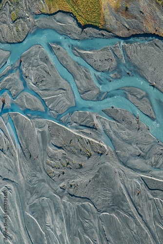 Wallpaper Mural An aerial view of Glacier water from Mount Cook flowing through the Waiho River in Franz Josef, Southland, New Zealand.  Torontodigital.ca