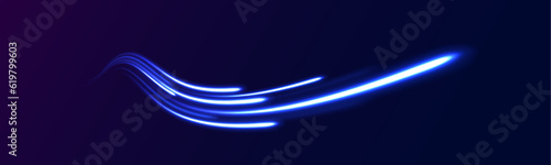 Light arc in neon colors, in the form of a turn and a zigzag. The effect of a long yellow and red path or autobahn at night. City light trails behind the traffic background. 