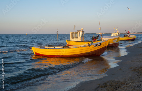 Fishing boats on the beach of Baltic Sea in Poland.