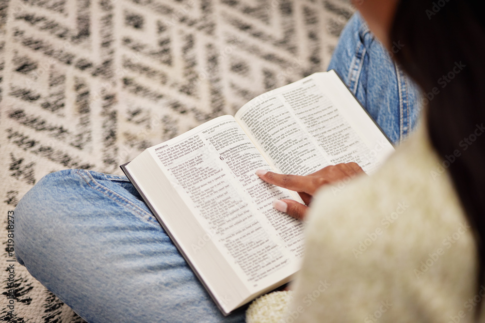 Naklejka premium Closeup, hands and woman with a bible, spiritual and religion for peace, guidance and learning. Zoom, female person or worship with praise, reading scripture and gratitude with prayer, home and relax