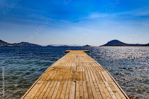 Wooden jetty into the beautiful Aegean Sea on the north peninsular of Bodrum. photo