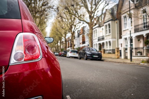 London- Car parked on street of terraced houses in Fulham, south west London
