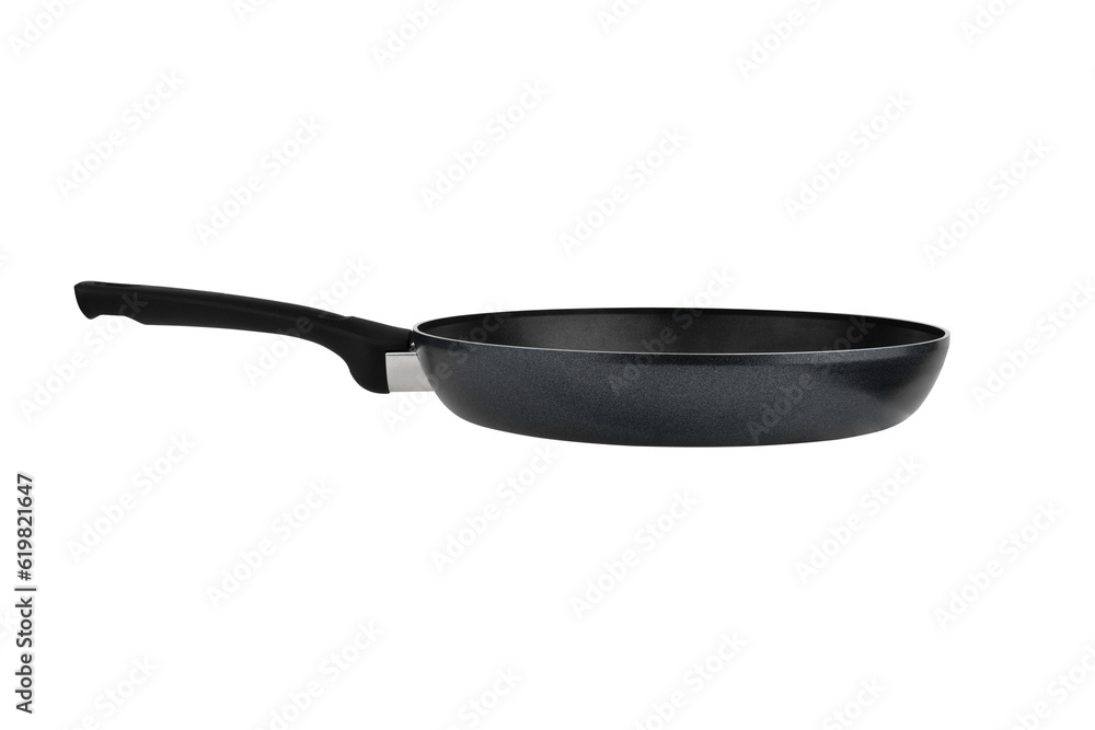 Frying pan on a white background. Frying pan close-up on a white background. Frying pan on a white background. Frying pan close-up on a white background.