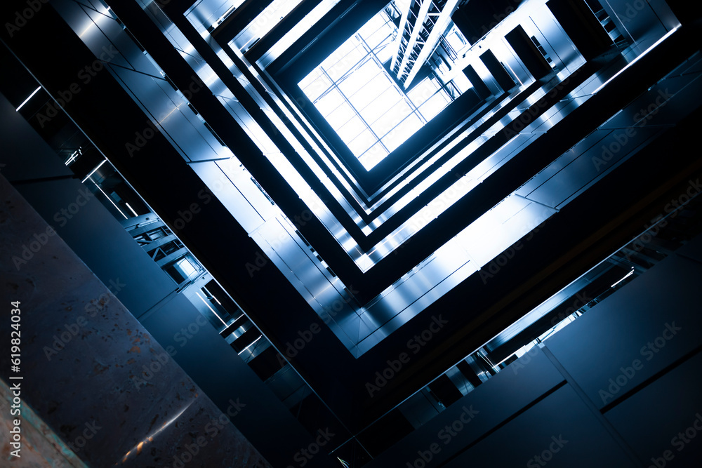 Modern urban architecture. Inside the office center. Upward view perspective.