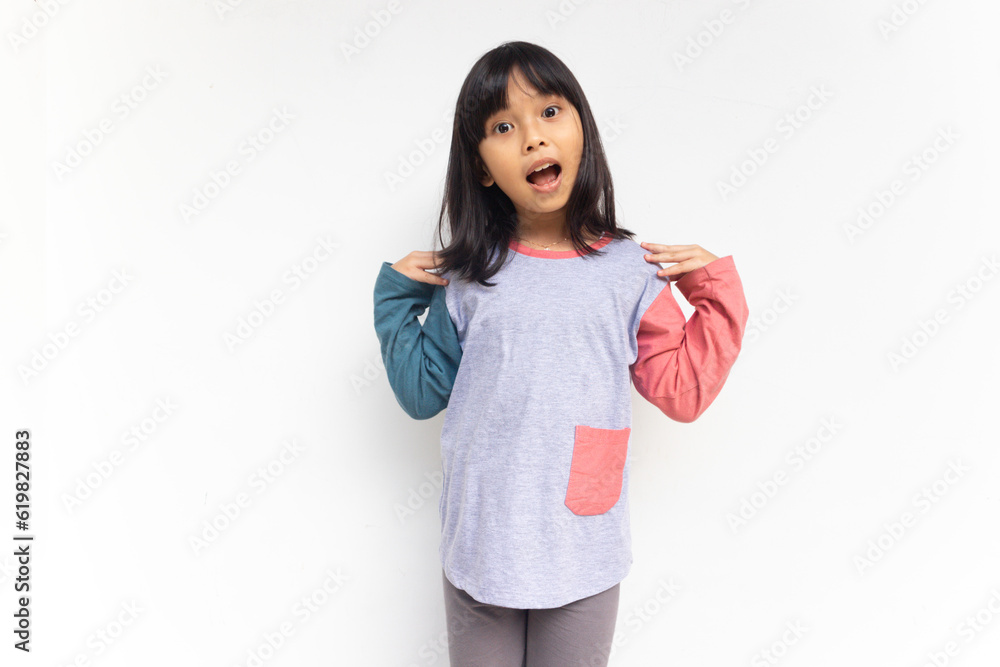 Surprised happy beautiful girl looking at camera in excitement, isolated on white background Surprised happy beautiful girl looking at camera in excitement, isolated on white background