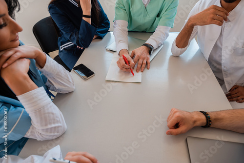 Bilde på lerret A medical team interacting at a meeting in the conference room.