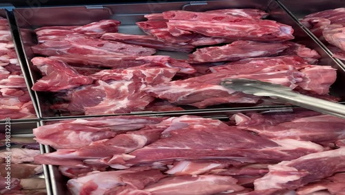 Choosing and buying pork in a wholesale department store