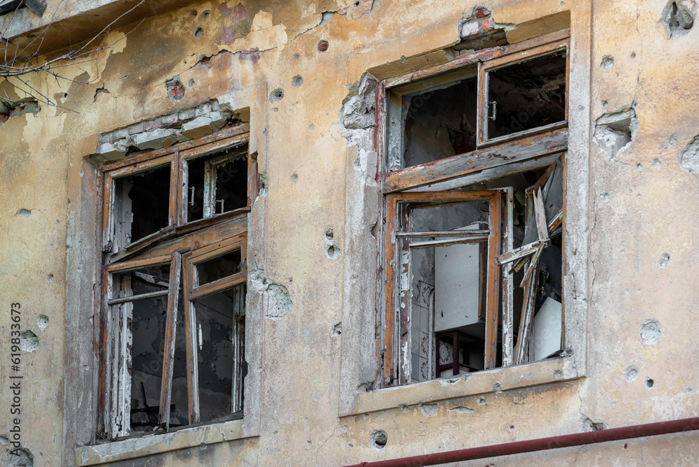 empty windows of a damaged house in Ukraine empty windows of a damaged house in Ukraine