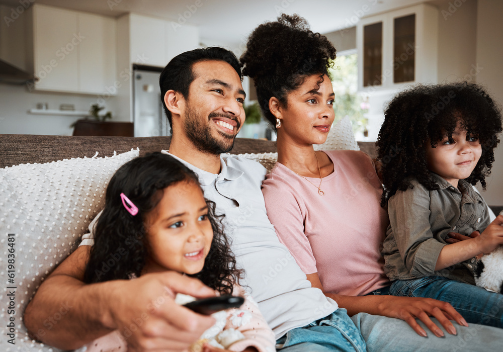 Mother, father and children on couch, watching tv and happy family bonding together in living room. Remote, happiness and parents relax with kids on sofa, streaming television show or movies in home.