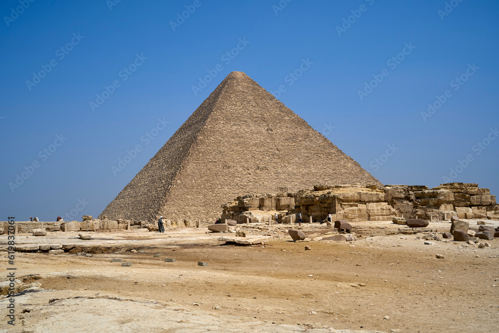 Distant view of the great Khafre pyramid on a clear day. The Great Pyramids of Giza, Giza Plateau, Cairo, Egypt Distant view of the great Khafre pyramid on a clear day. The Great Pyramids of Giza, Giza Plateau, Cairo, Egypt