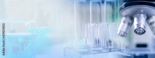 Science laboratory background, wallpaper or banner. Concept of biotechnology, chemist, glassware, discovery and experiment background. Biology and microscope banner. Scientist wallpaper.