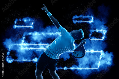 Padel tennis player. Padel open tour. Man athlete with paddle tenis racket on blue background. Sport concept. Download a high quality photo for sports website.